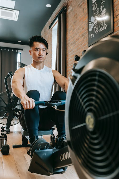 An athlete using a rowing machine
