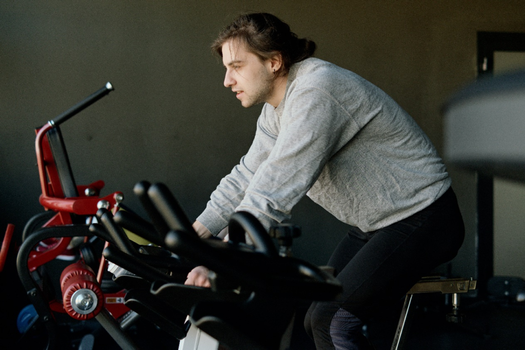 A person using a stationary bike